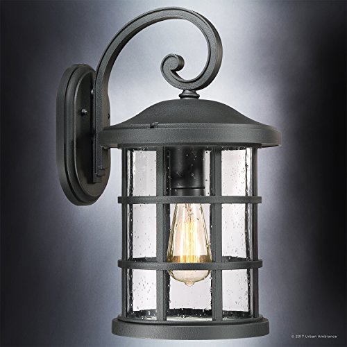 Image of Luxury Craftsman Outdoor Wall Light, Medium Size: 17.75 inch H x 10 inch W, with Tudor Style Elements, Wrought Iron Design, Natural Black Finish and Seeded Glass, UQL1044