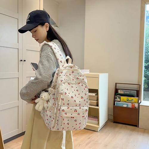 Mochila escolar floral con compartimento para laptop y asas acolchadas 7