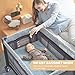 5 in 1 Multifunctional Pack and Play,Qutanix Foldable Baby Crib with Bassinets,Changing Table,Newborn Napper with Canopy,Diaper Stacker,Baby Playpen for Babies and Toddlers