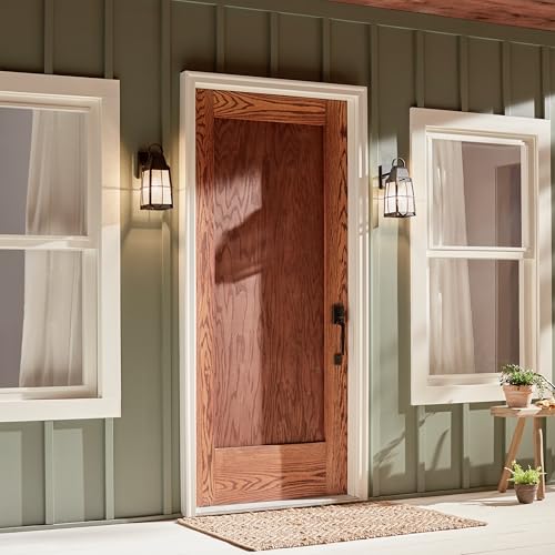 Image of Kichler Tolerand 12 inch Outdoor Wall Light in Textured Black, 1-Light Exterior Wall Sconce Porch Light with Clear Seeded Glass, (12 inch H x 5.75 inch W), 49552BKT