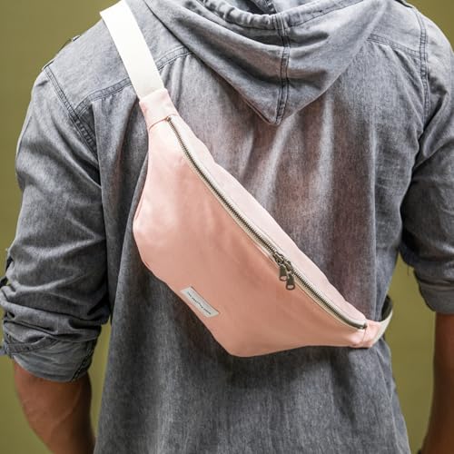 Image of The Peacock Crew Canvas Crossbody Sling Bag for Men & Women - Adjustable Strap, Dual Zippers Left /Right Handed, Secure Everyday Travel Fanny Pack Shoulder Pouch, Trekker Blush Pink, 14.5 x 6.3 x 3.6