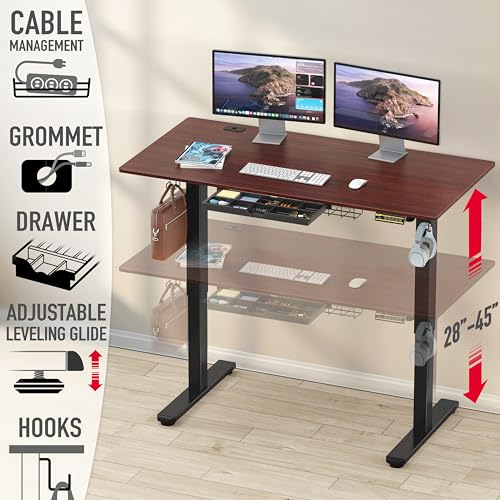 Image of SHW 55 x 28 Inches Electric Height Adjustable Standing Desk with Drawer and Memory Preset, Cherry
