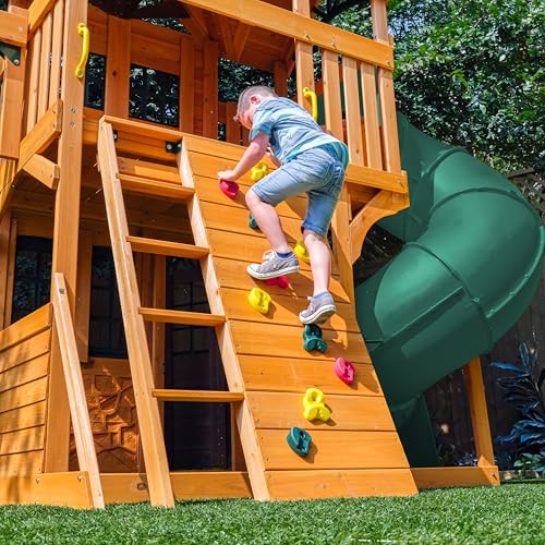 Image of KidKraft Buffalo Crossing Wooden Outdoor Swing Set with Tube Slide | Two-Story Playhouse, Rock Wall, Glider, Faux Stone Facade, Planter Boxes