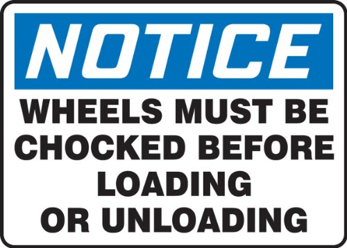 Panneau Wheels Must Be Chocked pour éviter le départ imprévu des camions