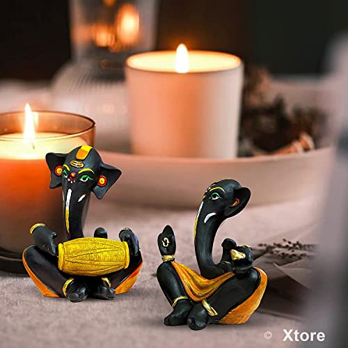 Image of Xtore Resin Floating Ganesha Statues Decorative Showpiece | Spreads Positive Vibes (Pack of 2, Black & Yellow)