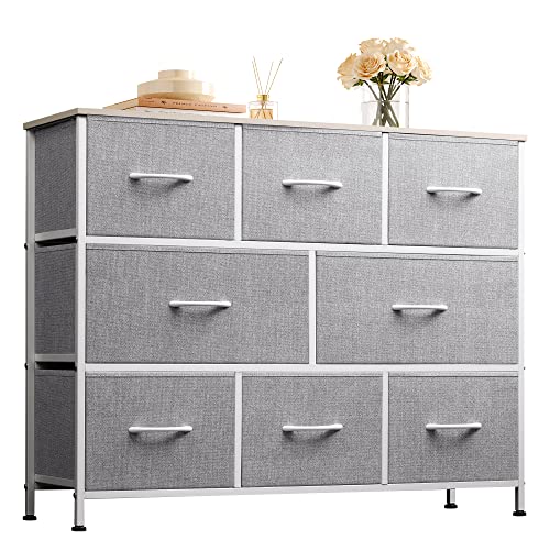 Image of WLIVE Fabric Dresser for Bedroom, Storage Drawer Unit, TV Stand for 32 40 43 inch TV, Wide Dresser with 8 Large Deep Drawers for Office, College Dorm, Light Grey