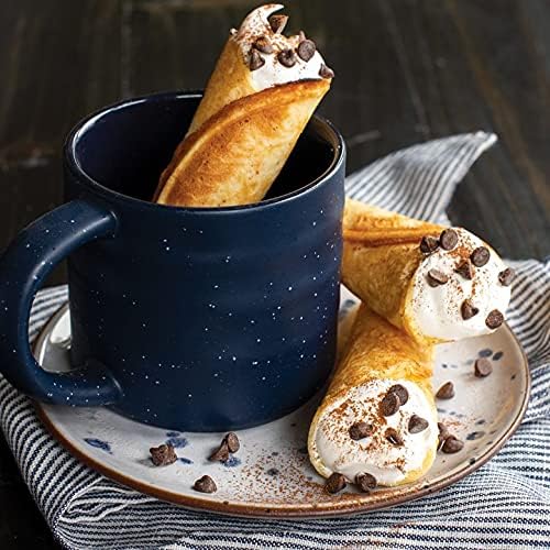 Krumkake cones filled with cream and chocolate chips, served in a mug