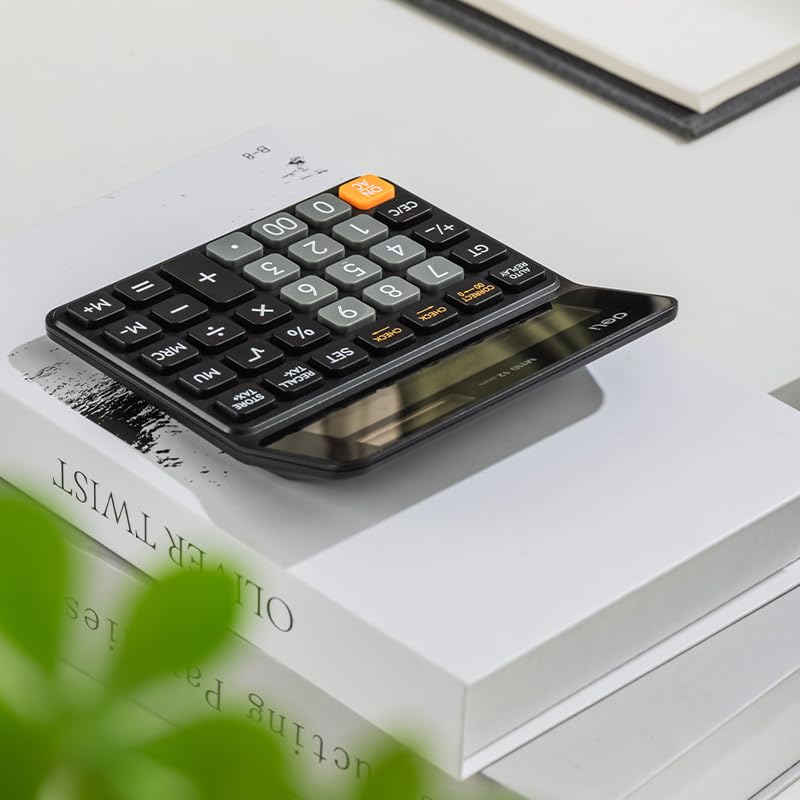 Deli EM110-12 Calculator placed on books, demonstrating its compact size.