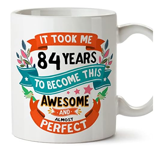 MUGFFINS Tazas 84 Cumpleaños - En Inglés - It took me 84 years to become perfect - 11 oz - Regalo original y divertido