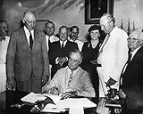 Social Security Act 1935 Npresident Franklin D Roosevelt Signing The Social Security Act In The Cabinet Room Of The White House 14 August 1935 Behind Him Congress Members Left To Right Robert Doughton