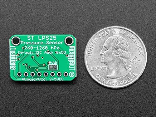 Bund view of the Adafruit LPS25HB Pressure Sensor board next to a US quarter for size comparison.
