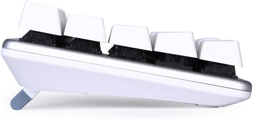 സൈഡ് പ്രോfile of the Qisan Magicforce keyboard showing the ergonomic step-wise keycap design and adjustable feet.