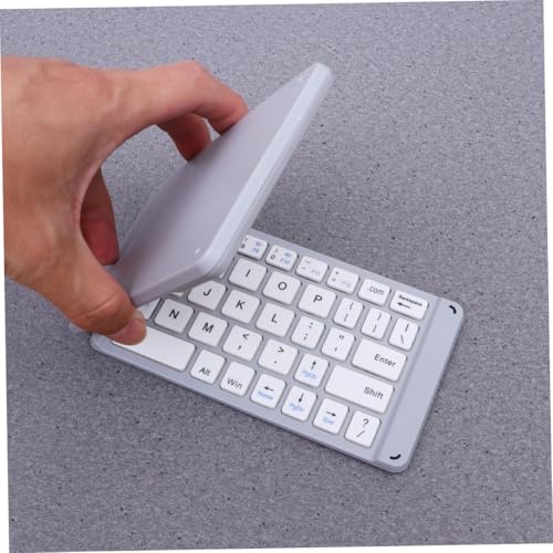 Teclado inalámbrico plegable ideal para trabajar en cafeterías con tu laptop 4