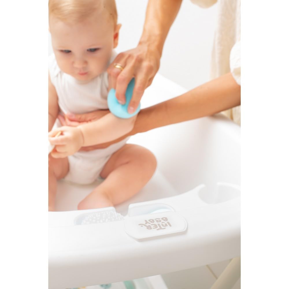 Interbaby Bañera Bebé Cambiador Plegable Patas, Ruedas, Hamaca (Dino) | Bañera con cambiador 2 en 1, hamaca anatómica extraíble, patas antideslizantes, altura ergonómica, portátil