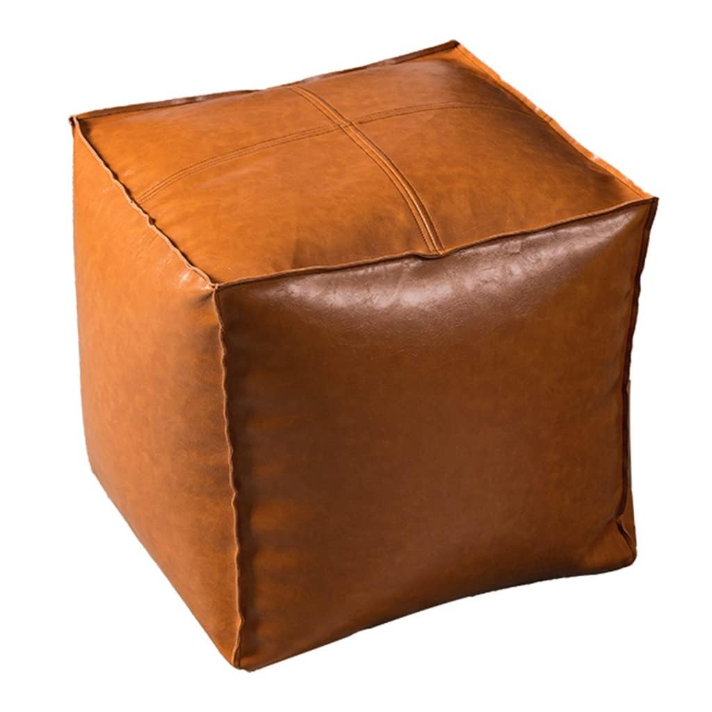 Pouf Ottoman orange pour créer un coin lecture chaleureux au sol