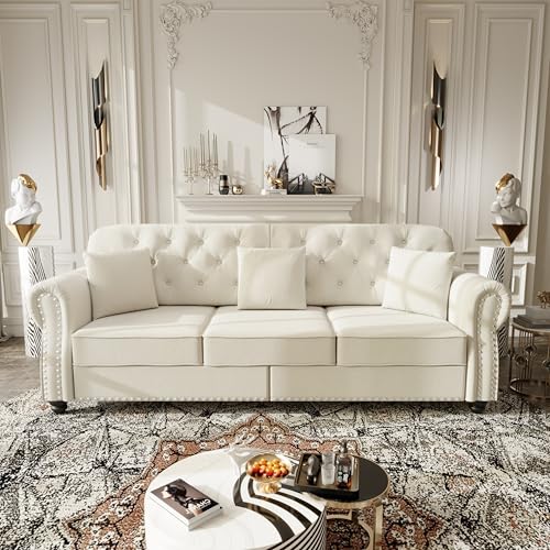 Image of KEIKI 83 inch Velvet Chesterfield Sofa with Rolled Arms & Nailhead Trim & 2 Ottoman, Modern 3-Seater Button Tufted Couch with High Resilience Cushion & 3 Pillow, Easy Assembly, for Living Room, White