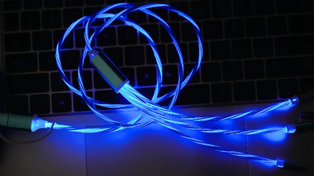 Image of 6-in-1 LED Blue Flow Charging Cable, 47-inch USB Cable, Supports Simultaneous Charging & Data Transfer, Flexible Tangle-Free PVC, Multi-Device Compatible, Charges 3 Devices at Once.