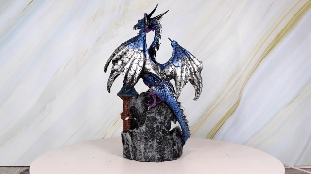 Figura Dragón Azul Metálico con Globo de Agua y Castillo 8" miniatura 7