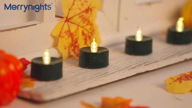 Image of merrynights Green LED Candles, 24 Pack Tea Lights Candles Battery Operated, Flameless Tealight Candle, Realistic Tea Lights for Halloween Christmas Party Decor Mardi Gras