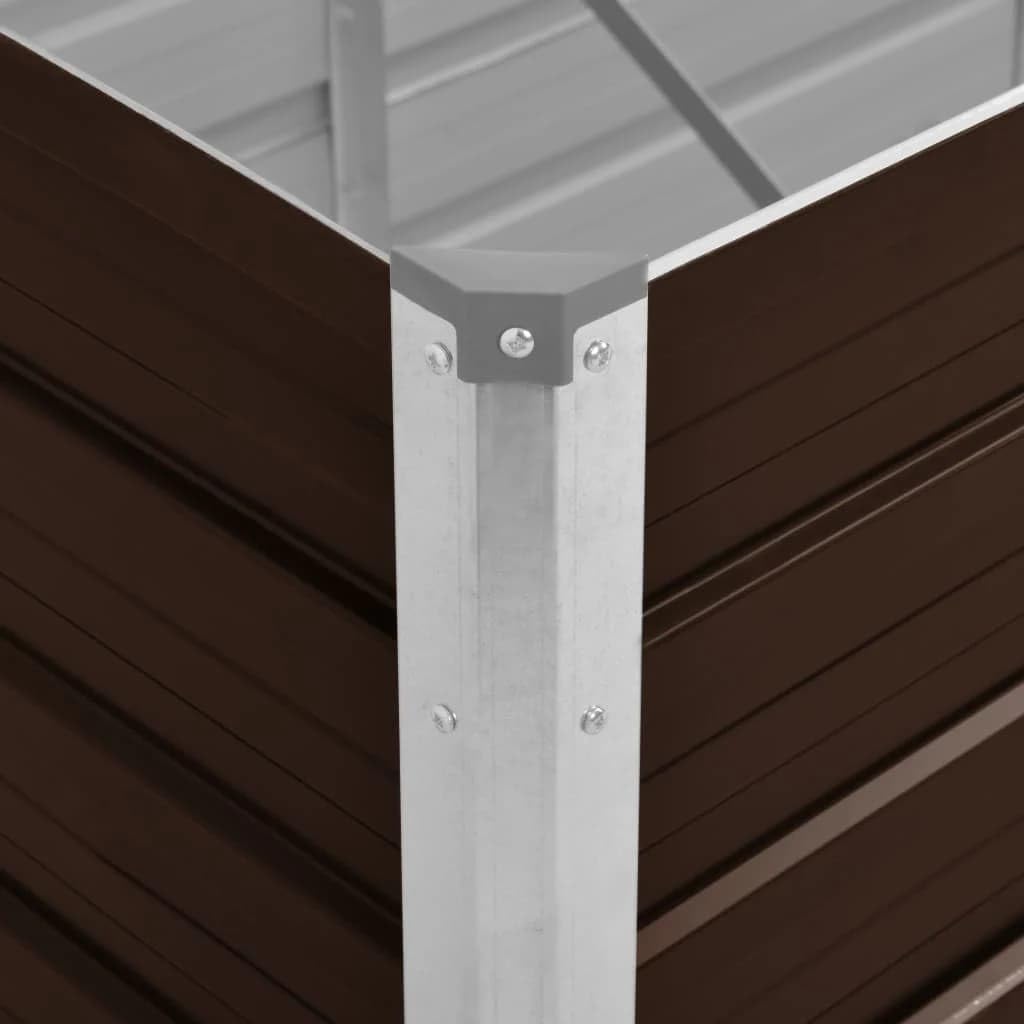Close-up of a corner connection on the raised bed, showing screws and galvanised steel