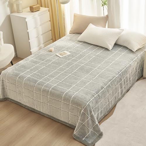 Plaid en flanelle douce idéal pour les soirées sur le canapé