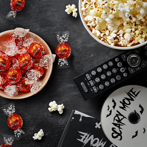image for Lindt LINDOR Milk Chocolate Candy Truffles, Halloween Party Candy with