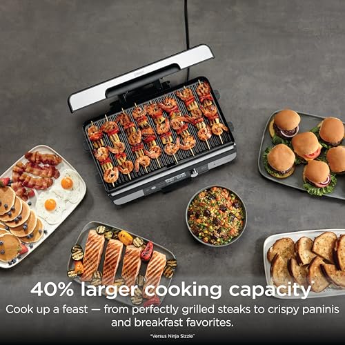 Image of Ninja Sizzle Pro XL 20-Inch Indoor Griddle + Grill, Detachable Ventilated Lid, Grease Control, Ceramic Nonstick Plates, Even Edge Cooking, Extra Large Capacity, Versatile, Silver, GX101