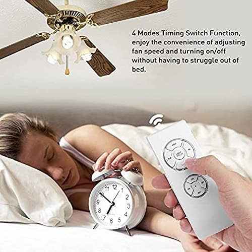 A person using the remote control to adjust a ceiling fan from bed, demonstrating the timing function.