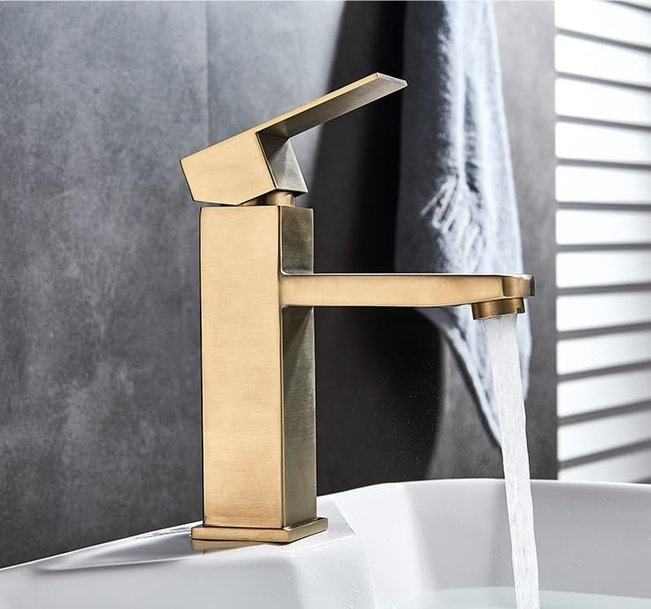 Grifo mezclador de agua fría y caliente con acabado dorado exclusivo para lavabo de baño