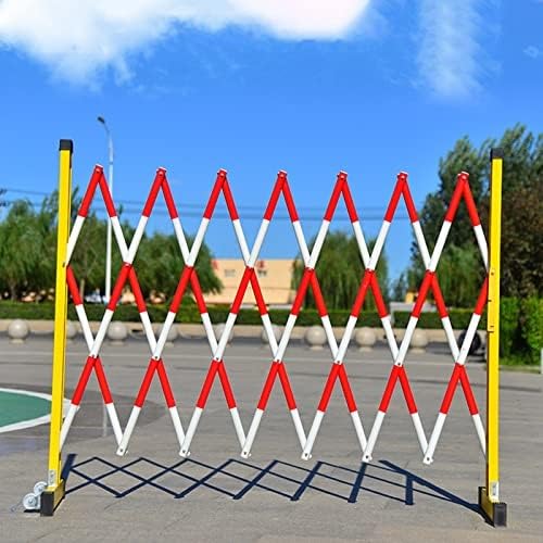 Barrière rétractable avec rouleaux pour bloquer l'accès aux garages et chantiers routiers