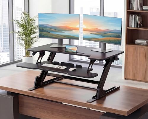 Image of HUANUO 32 inch Z Shaped Standing Desk Converter with Wide Keyboard Tray, Black | Instant Sit-Stand Convert,Fits Dual Monitors,Dual Gas Spring Lifter,Wobble-Free Z-Steel,Quick Keyboard Install