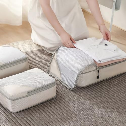 Sacs de compression voyage contre le manque de place pour vêtements et couettes