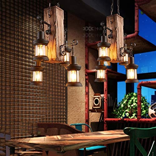 Lustre bar nostalgie en bois massif travaillé avec quatre têtes suspendues rétro