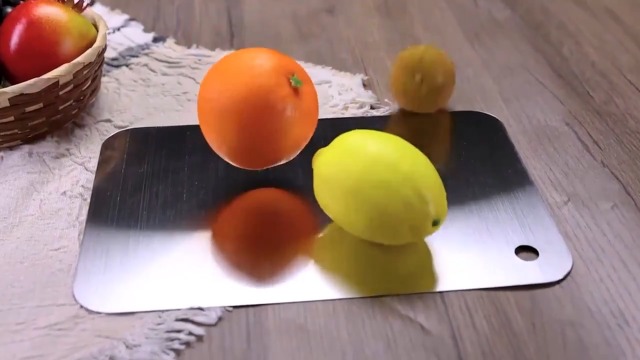 Tabla de cortar redonda de acero inoxidable miniatura 7