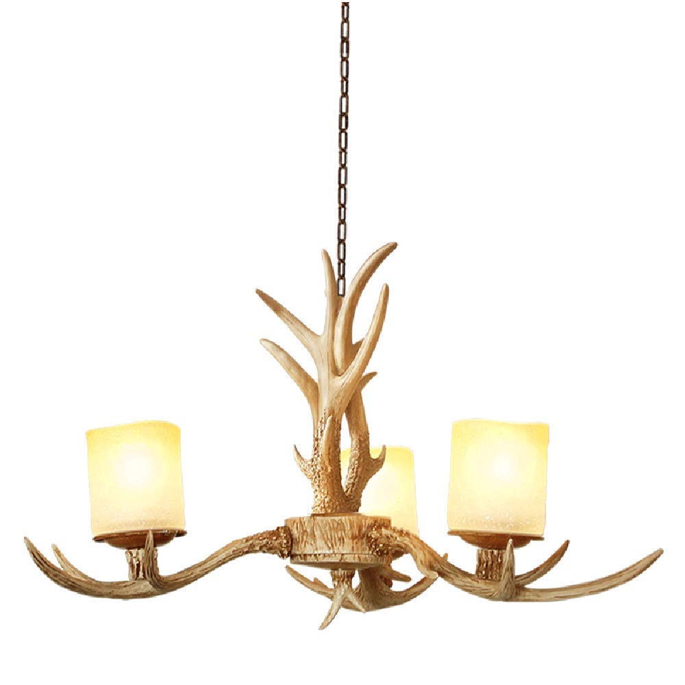 Lustre en bois de cerf pour un salon chaleureux et cosy