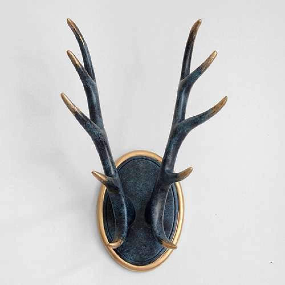 Décoration murale suspendu bois nordique pour embellir un mur vide