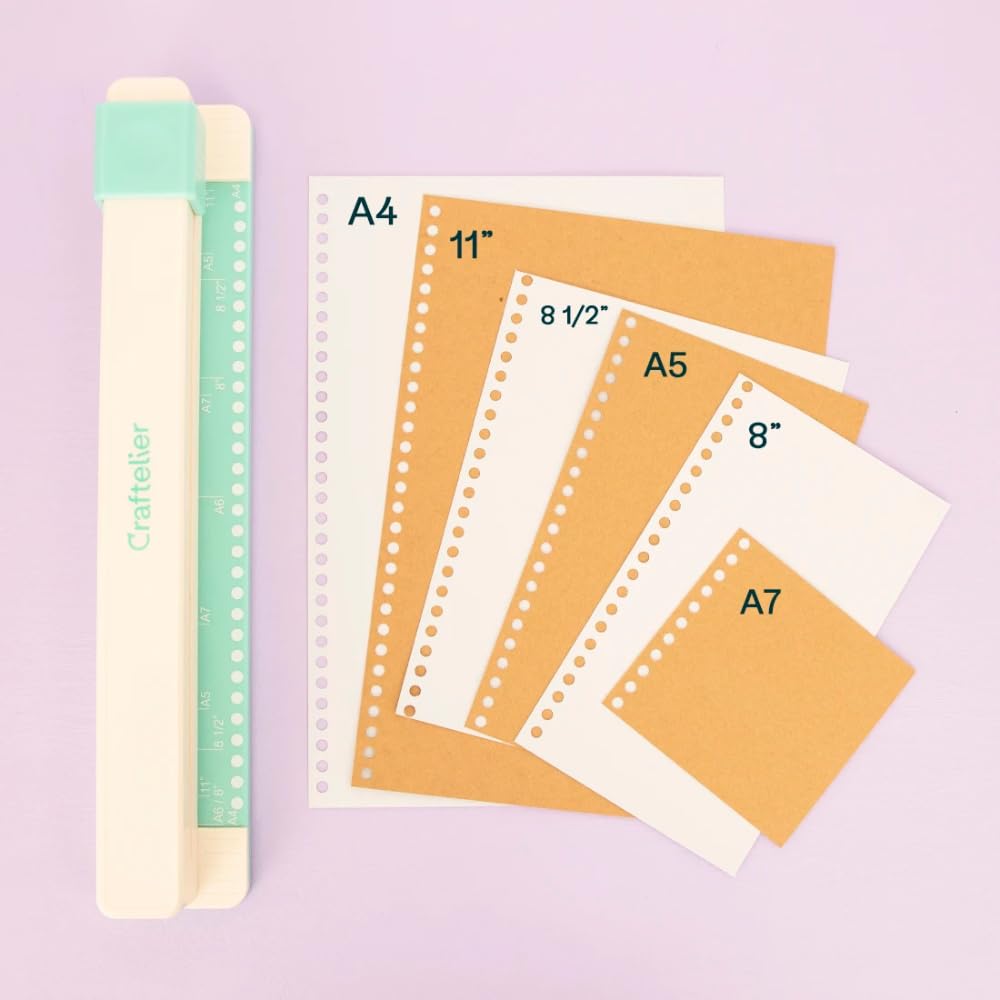 Craftelier - Encuadernadora Manual de 30 Agujeros - Perforadora con 6 Anillas Tonos Blanco y Negro - Perfora hasta 5 Hojas - Compatible con Tamaños de A4, A5, A6, A7 - Para Cuadernos y Scrapbooking