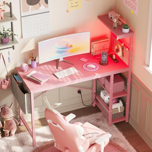 Image of Bestier Pink Gaming Desk with Power Outlets, 44 Inch Led Gamer Desk with 4 Tiers Reversible Shelves, Computer Desk with Headset Hook & Side Storage Bag for Bedroom (Pink 3D Carbon Fiber)