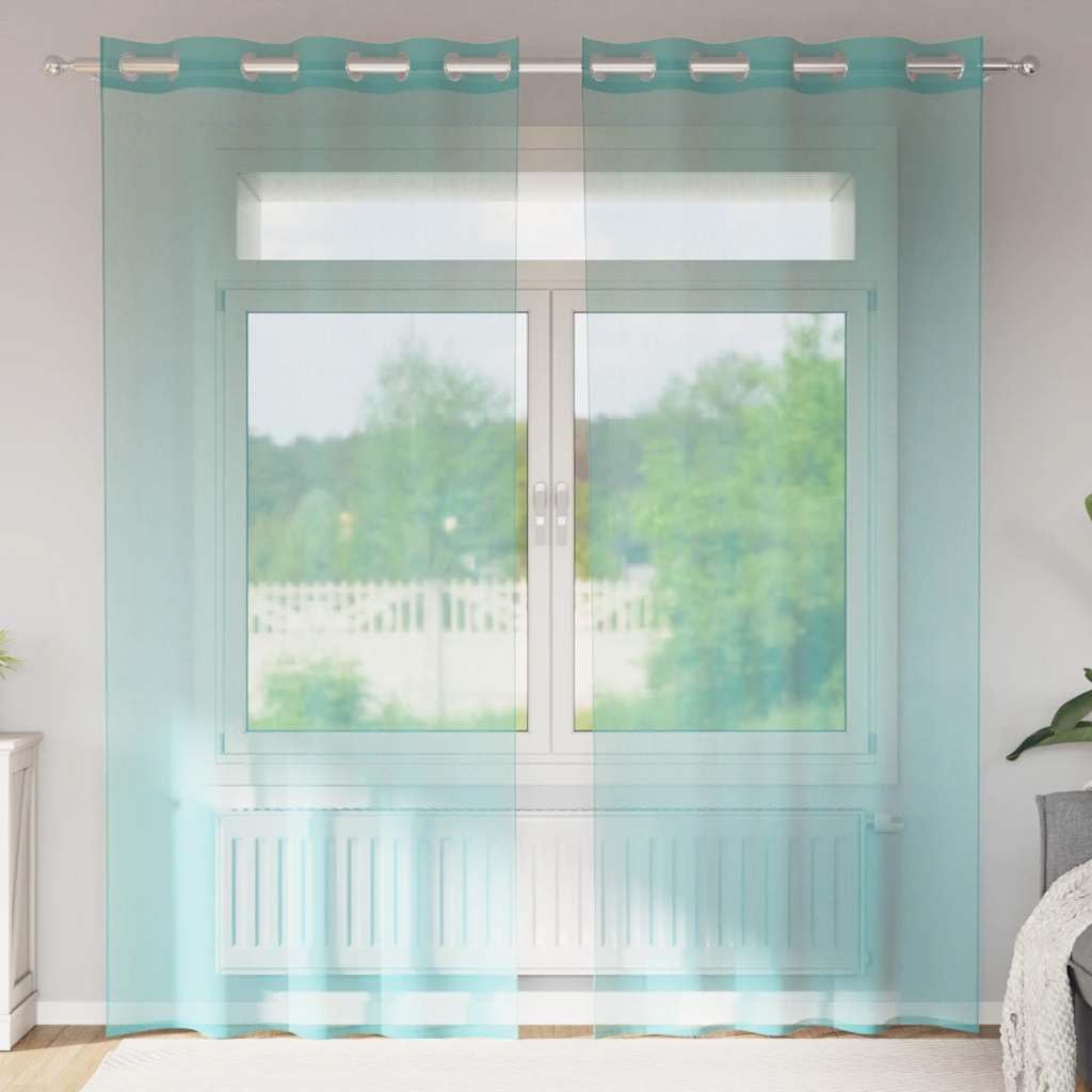 Rideaux en voile turquoise pour une décoration de salon moderne et lumineuse