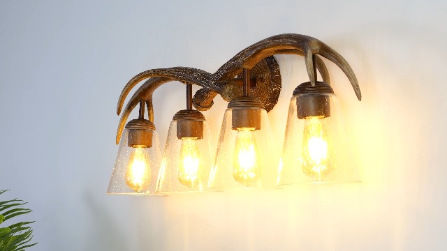 Image of JONATHAN Y 32.5 inch Brown Wood Finish 4-Light Resin Antlers Vanity Light Wall Sconce Rustic Farmhouse for Living Room Bathroom with Clear Seeded Glass Shades LED Bulbs Included JYL6315A