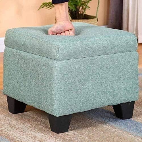 Repose-pieds ottoman pour optimiser les petits salons encombrés avec son coffre