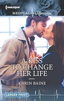 Paperback A Kiss to Change Her Life Book