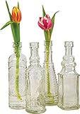Luna Bazaar Small Vintage Glass Bottle Set (7-Inch, Dakota Design, Clear, Set of 4) - Flower Bud Vase Set - For Home Decor, Party Decorations, and Wedding Centerpieces