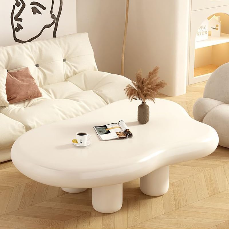 Table basse nuage épaisse design asymétrique avec grand plateau irrégulier beige