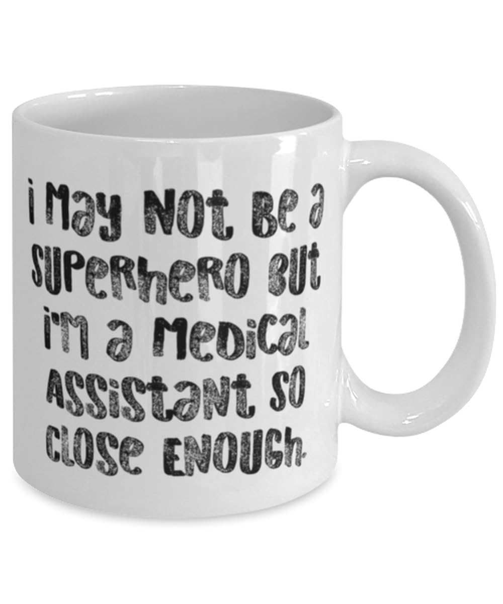 Cool Medical assistant Gifts, I May Not Be a Superhero but I'm, Medical assistant 11oz 15oz Mug From Coworkers, Cup For Friends, Gag gifts for medical assistants, Funny medical assistant shirts, Funny