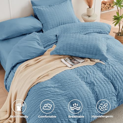 Image of HYMOKEGE Mineral Blue Oversized King Comforter Set Seersucker 7 Pieces, All Season Luxury Bed in a Bag for Bedroom, Bedding Set with Comforter, Sheets, Pillowcases & Shams