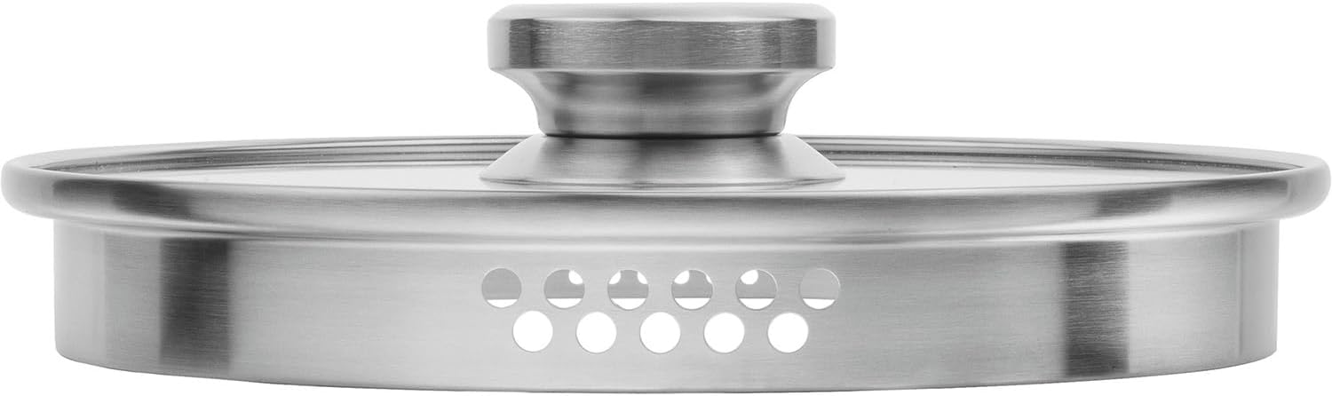 ക്ലോസ് അപ്പ് view of the ZWILLING Pouristic Stock Pot lid, showing the integrated strainer holes.
