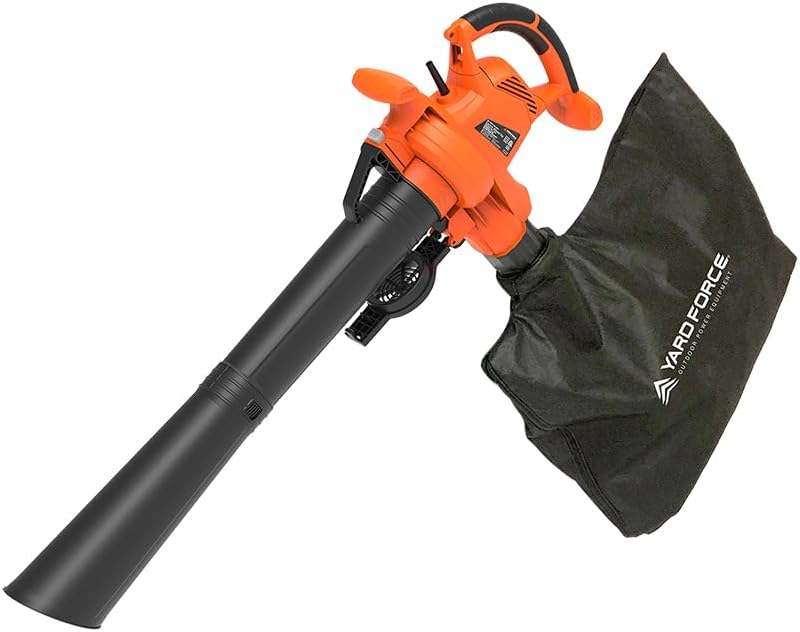 Person using the Yard Force 12A Electric Leaf Blower to clear leaves from a pathway.