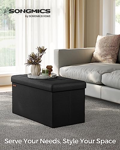 Image of SONGMICS Mazie Collection - 30 Inches Folding Storage Ottoman Bench, Ottoman Foot Rest, End of Bed Bench, Storage Chest, Load 660 lb, for Living Room, Bedroom, Entryway, Ink Black ULSF047B01