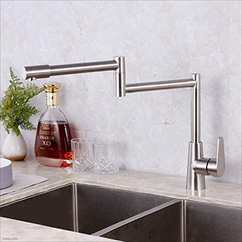 Robinet d'eau pliable pour évier devant fenêtre de cuisine